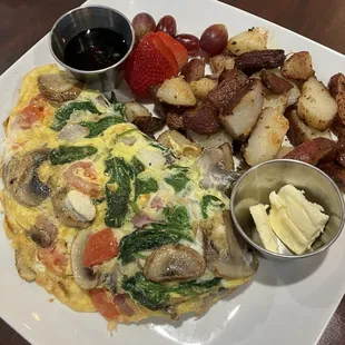 Veggie omelette that comes with the best seasoned potatoes you'll ever have
