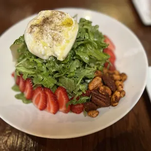 Burrata Salad with the strawberries and nuts arrangement