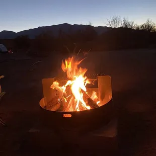 Evening campfire with Stuart Mountain Range as a backdrop