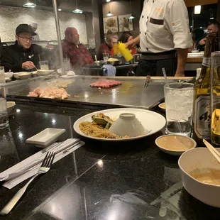 Raw Chicken, Shrimp and Beef all cooked together ... no thank you. Eat at your own risk!