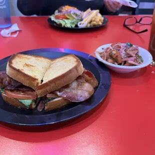 BLAT sandwich with cucumber/tomato salad