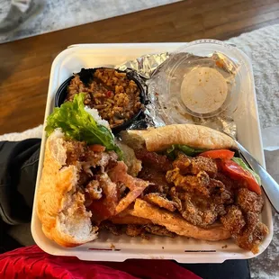 Lobster roll with jambalaya. Sorry I started to eat before I took the pic.