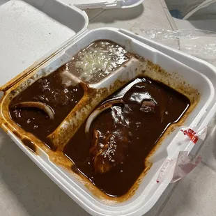 There's rice under the mole in upper left. Beans sludgy.