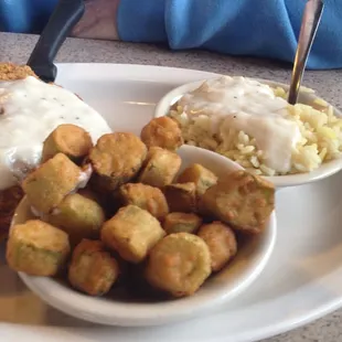 Fried Steak with Peppered Gravy ($7.49), sides of Fried Okra and Buttered Rice with Peppered Gravy. Very well done!