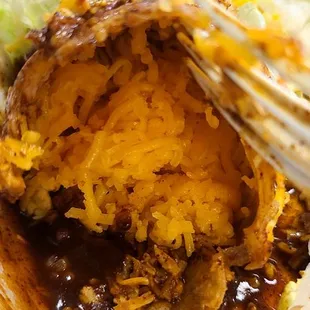 Wants to be an enchilada but pictured is a chingadera.