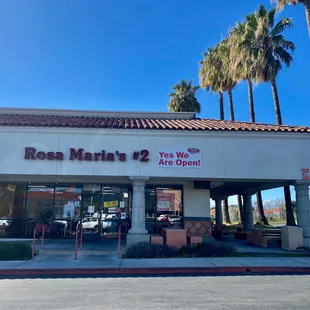 The front of Rosa Maria's. There are tables outside on right side of restaurant.