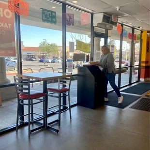 The seating has some small high tables for two people and standard tables that seat four people to six people.