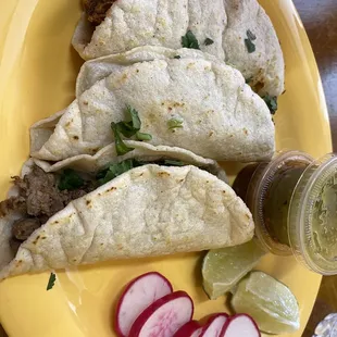 Handmade tortillas; tacos of asada, pollo, al pastor