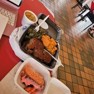 Smoked Meatloaf has rum BBQ sauce!! You see those Yams &amp; Greens. Cake is strawberry.  Peach  Cobbler in the back