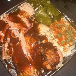 2 meat two side plate with brisket and a chicken quarter collard greens potato salad