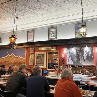 people sitting at the bar