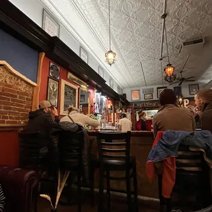 people sitting at the bar