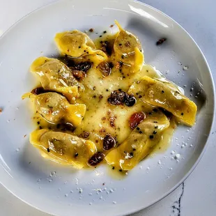 Casoncelli : Veal, Golden Raisin, Amaretti, Parmesan. $17