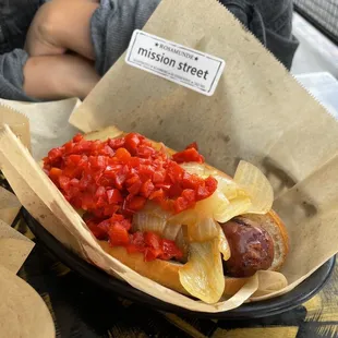 Mission Street sausage with sweet peppers and grilled onions