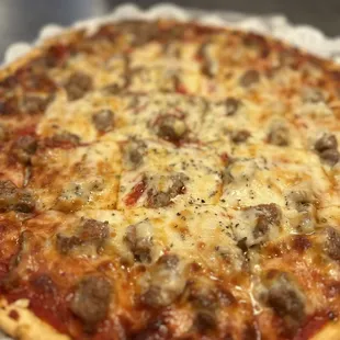 Extra thin crust sausage pizza. Yummy!