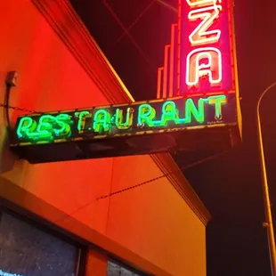 a neon sign for a restaurant