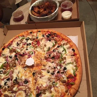 Pizza, wings and salad.