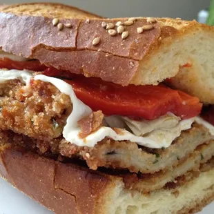 My wife's invention (and photo).   Sandwich with eggplant, artichokes, roasted red peppers, fresh mozz, and roasted red peppers.