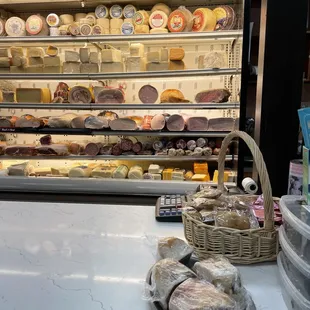 a display of cheeses and pastries