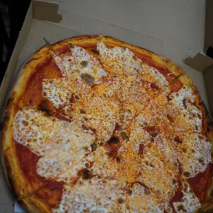 Large regular pizza. Best we've had so far in Astoria.