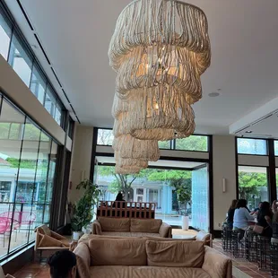 Inside the new Rosario's restaurant lounging by their bar