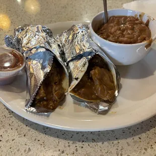 Cascabel Tacos ($16.99) - diced pork simmered in a Chile Cascabel sauce, with a side of frijoles a la charra.