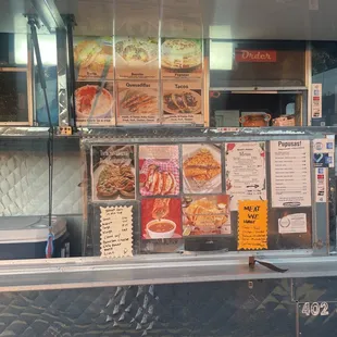 a food truck with menus