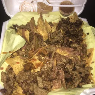 This was my carne asada nachos. And customer service was poor