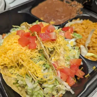 3 tacos,rice,beans Salsa,two flour tortillas