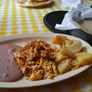 Chorizo and egg with papa's and refried bean and corn tortillas!  #FGMD