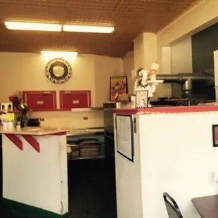 The counter area; the pizza oven and one hard-working man behind that wall on the right.