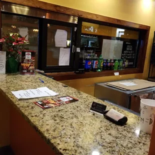 A Takeout counter with a take out window for the fast service on offer for the travellers