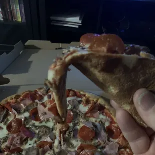 Floppy slice no crisp and not completely done.