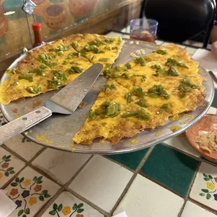 Cheese crisp with fresh green chilies.