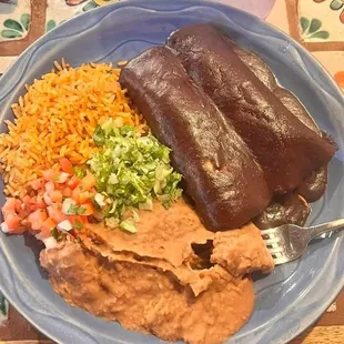 Chicken enchiladas with mole.