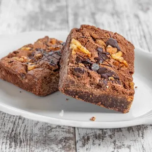 two brownies on a white plate