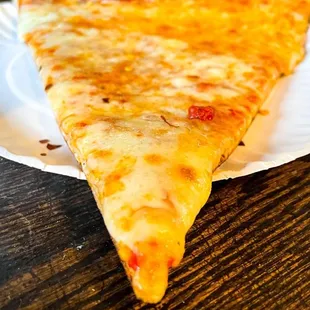 Regular Pizza Slice. $3 + tax + tip