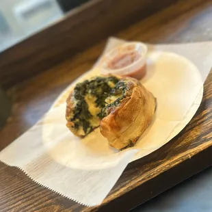 a pastry with spinach and cheese