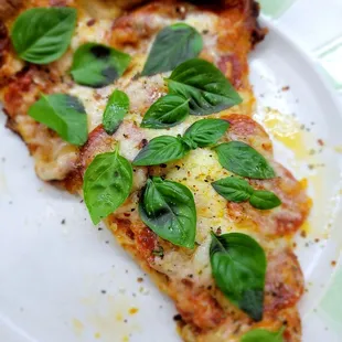 Pepperoni Slice with home grown basil