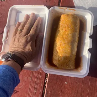 Chorizo and potato burrito smothered in red sauce