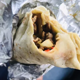 Beef fajita burrito (add spicy salsa) is hubby's fave get it :)'