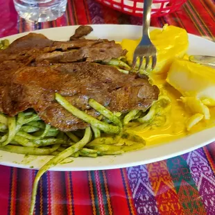 My Carne Asada dish... this potatoes on the side were SOOOOO GOOD