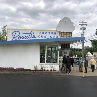 a group of people standing outside