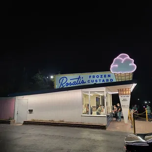 an ice cream shop at night