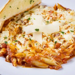 a plate of pasta and bread