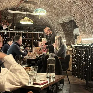 Owner serving parmigiana out of the wheel