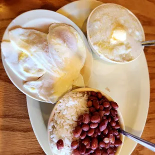 Red beans and rice with grits and eggs.