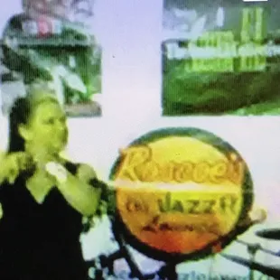 a woman holding a microphone