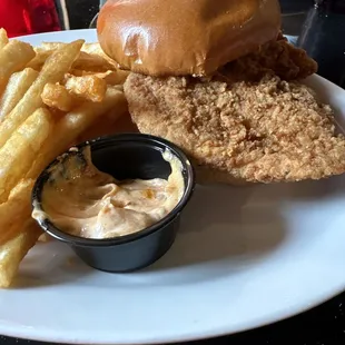 Chicken sandwich with romoulade sauce.