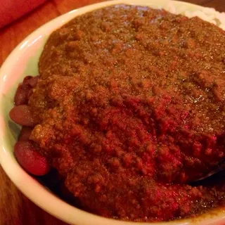 Bowl of Chicken Chili over White Rice or Beans